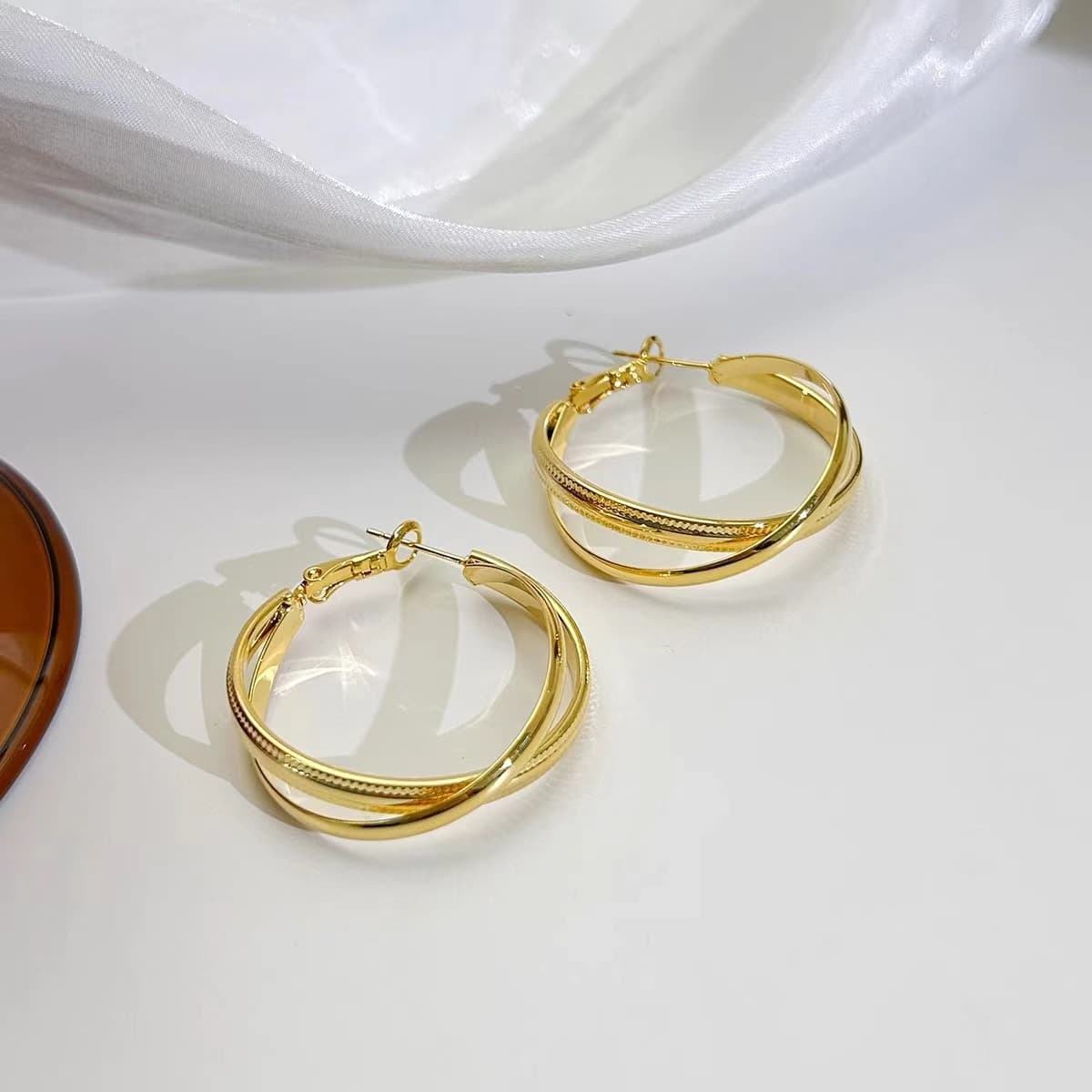 フープ ピアス 優美な三連リングフープピアス